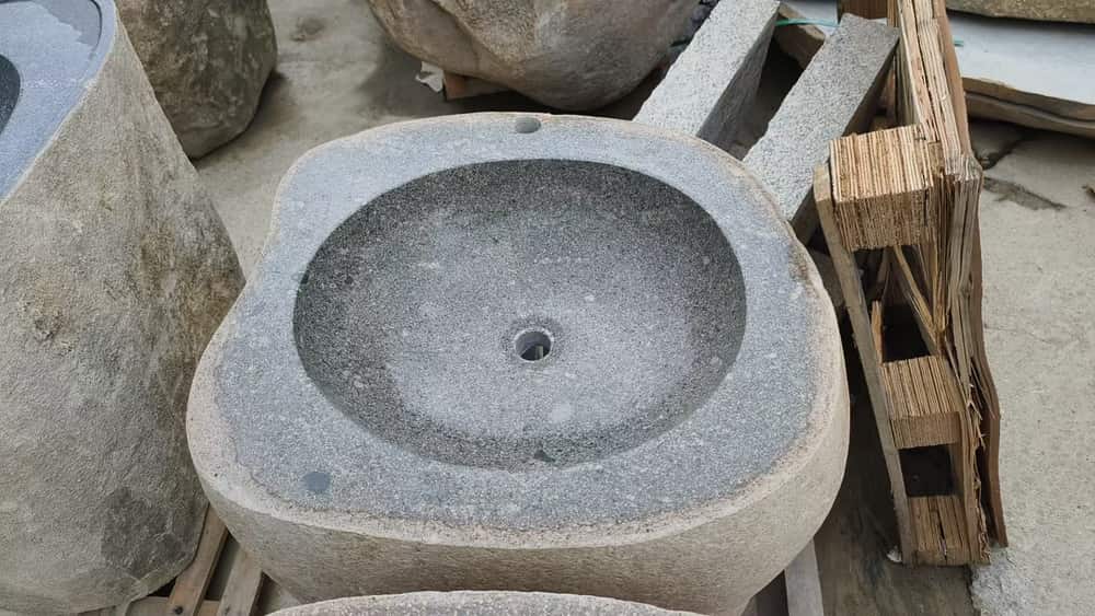 Square natural stone basin with polished bowl and drain opening